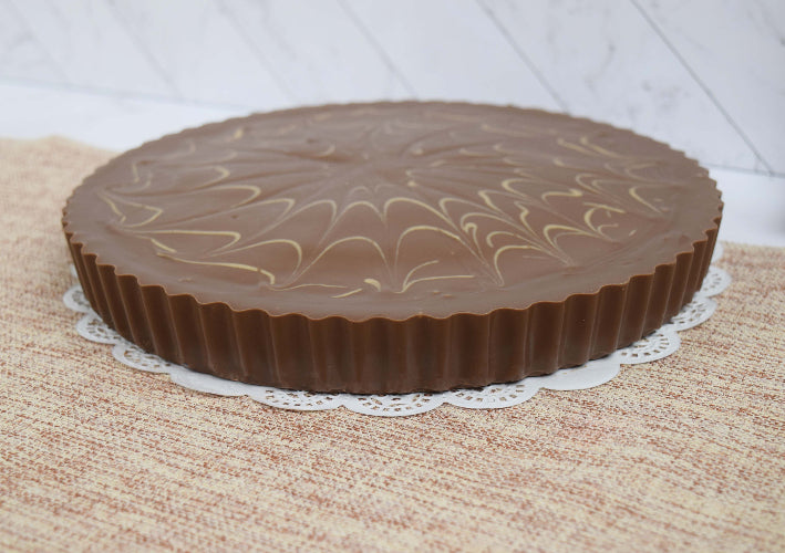 Colossal Peanut Butter Cup on Lace Doily
