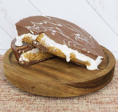 Milk Chocolate Peanut Butter Cup Cut in Half to Reveal Peanut Butter and Marshmallow Fluff Filling