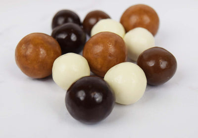 Malt Ball Medley Including Peanut Butter, Dark Chocolate, Milk Chocolate, and Yogurt-Covered Malt Balls