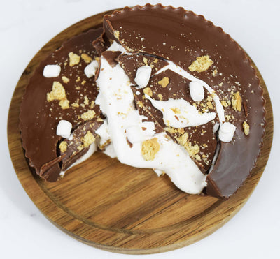 Top Angle of Milk Chocolate Cup Cut in Half to Reveal Marshmallow Filling with Crushed Graham Crackers