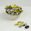 Bowl filled with gold and silver wrapped coffee prims