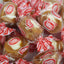 Geezer's Careml Creams candy wrapped in red and white wrappers with visible brand logo.